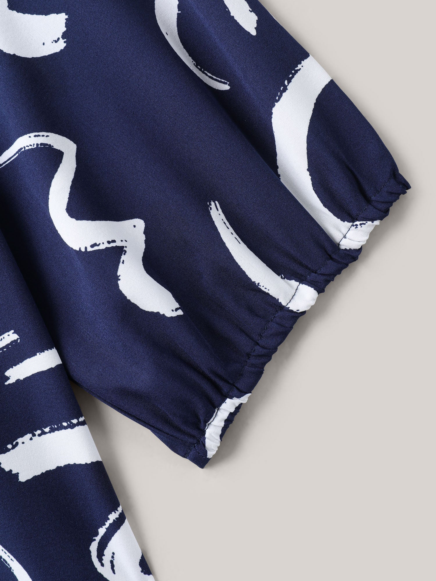 Scribble Print Ruffled Split Neck Blouse